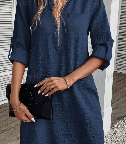 Vestido texturizado con cremallera, medio abotonado y bolsillos de parche